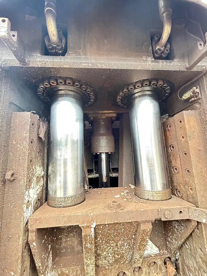Hydraulic cylinder detail of the used Zato Blue Whale scrap shear press.